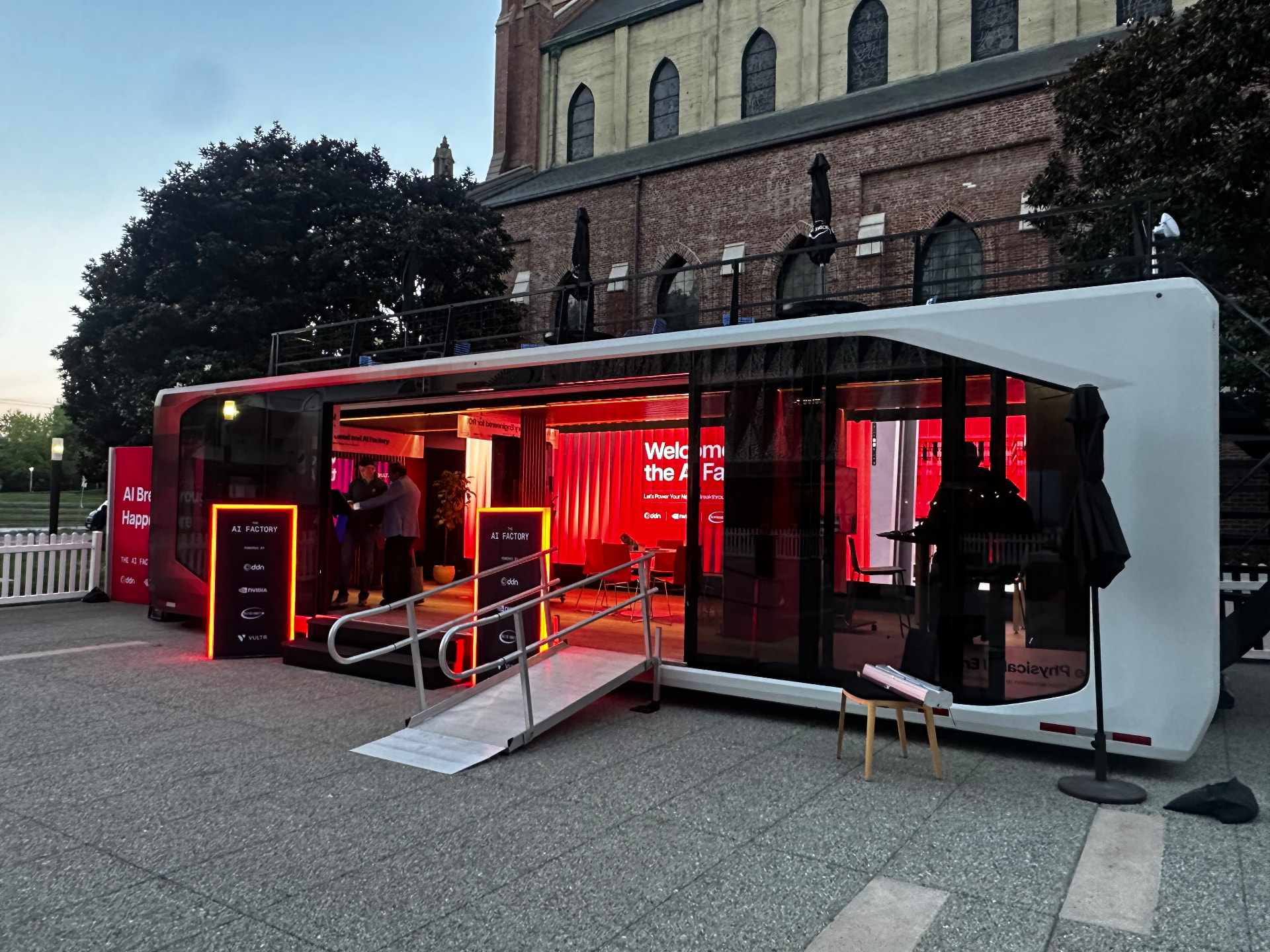 AI Factory on Wheels mobile brand activation experience at a B2B technology event